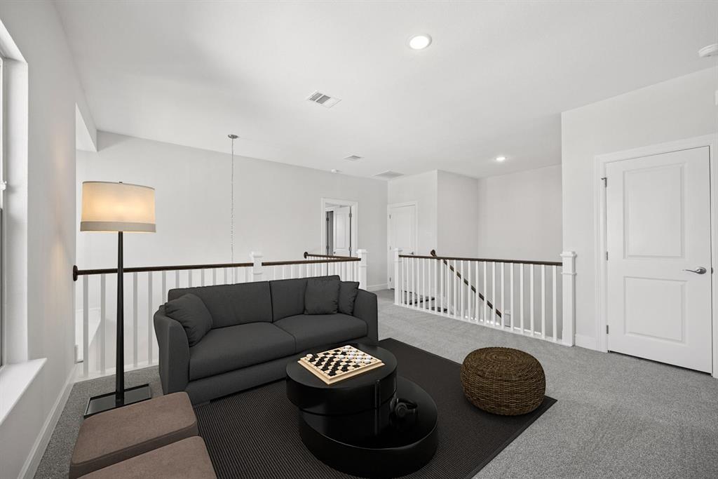 1317 Benjamin Trail Van Alstyne, TX 75495 - Photo 16 of 29 a living room with furniture and a wooden floor