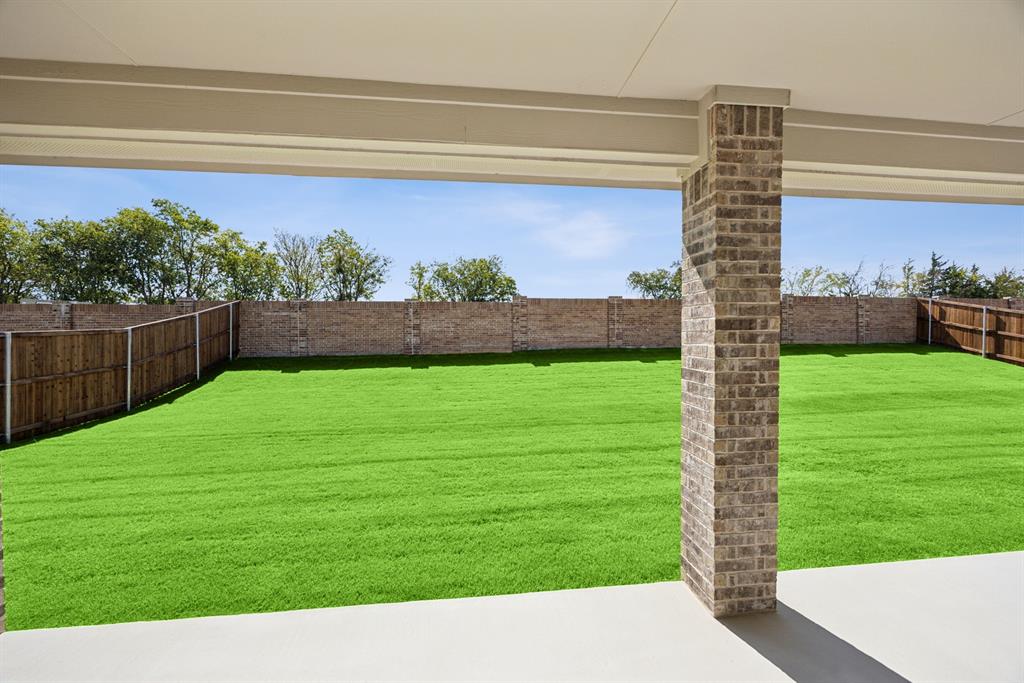 1317 Benjamin Trail Van Alstyne, TX 75495 - Photo 24 of 29 a view of yard with an outdoor seating