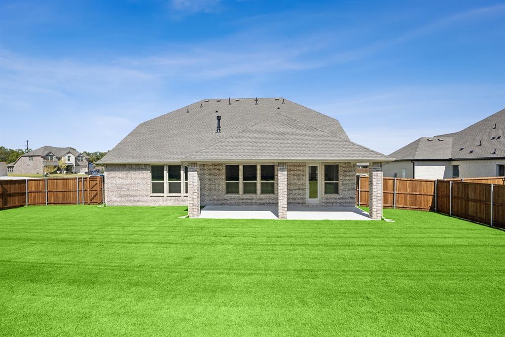 1317 Benjamin Trail Van Alstyne, TX 75495 - Photo 26 of 29 a big house with swimming pool in front of it