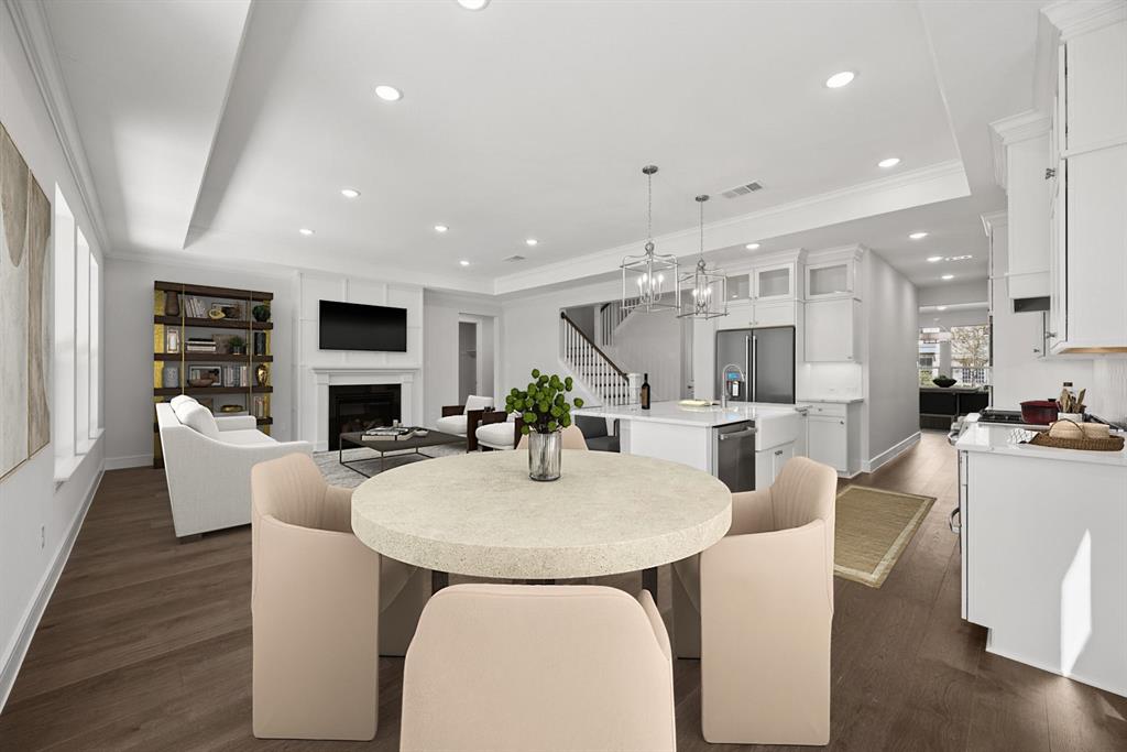 1317 Benjamin Trail Van Alstyne, TX 75495 - Photo 8 of 29 a living room with stainless steel appliances kitchen island granite countertop a dining table chairs and a kitchen view