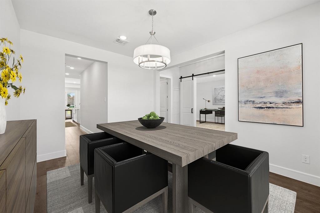 1317 Benjamin Trail Van Alstyne, TX 75495 - Photo 9 of 29 a view of a dining room with a table and chairs