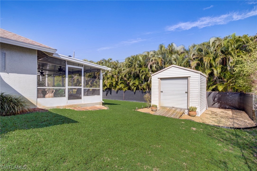 8337 Robin Road Fort Myers, FL 33967 - Photo 30 of 36 a view of a backyard with a garden