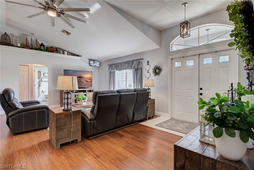 8337 Robin Road Fort Myers, FL 33967 - Photo 4 of 36 a living room with furniture and a potted plant