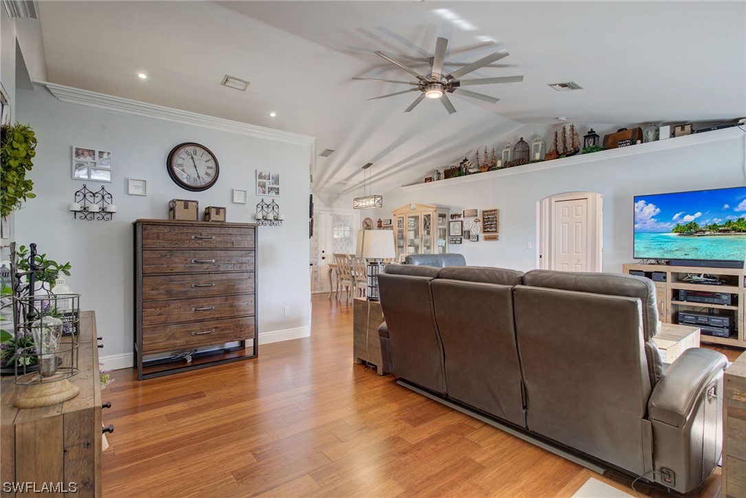 8337 Robin Road Fort Myers, FL 33967 - Photo 5 of 36 a living room with furniture and a flat screen tv