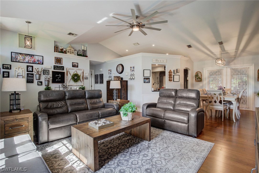 8337 Robin Road Fort Myers, FL 33967 - Photo 7 of 36 a living room with furniture and wooden floor