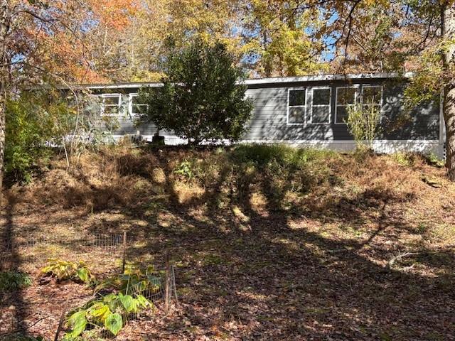 616 Gibson Trail Jasper, GA 30143 - Photo 1 of 15 front view of house with a yard