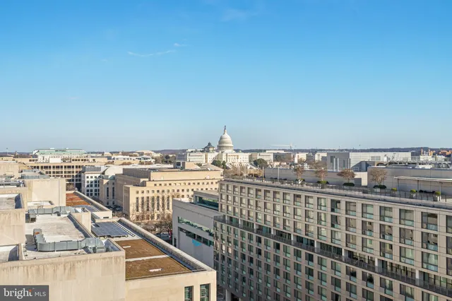 a view of a balcony with city view