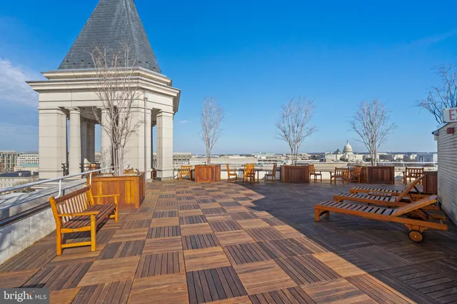 a view of a terrace with seating area