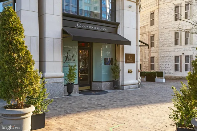 a view of a street with cars