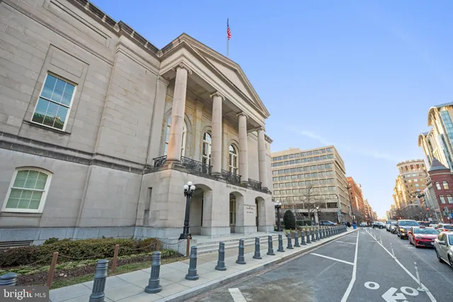 a view of a city with tall buildings