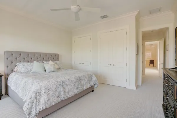 a bed and a chair in a room