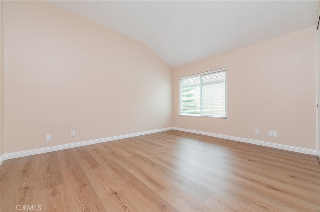 7 Tivoli Irvine, CA 92620 - Photo 21 of 29 wooden floor in an empty room with a window