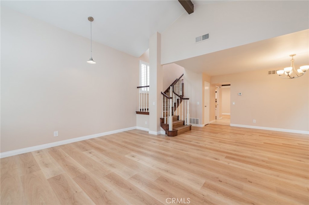 7 Tivoli Irvine, CA 92620 - Photo 6 of 29 a view of empty room with wooden floor