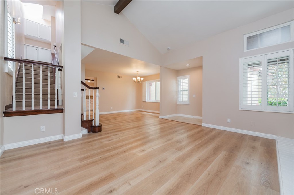 7 Tivoli Irvine, CA 92620 - Photo 9 of 29 wooden floor in an empty room with a window
