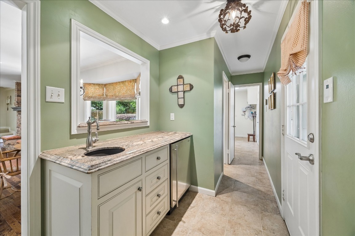 12206 Perthshire Road Houston, TX 77024 - Photo 16 of 30 Wet bar with pass through window for serving beverages.