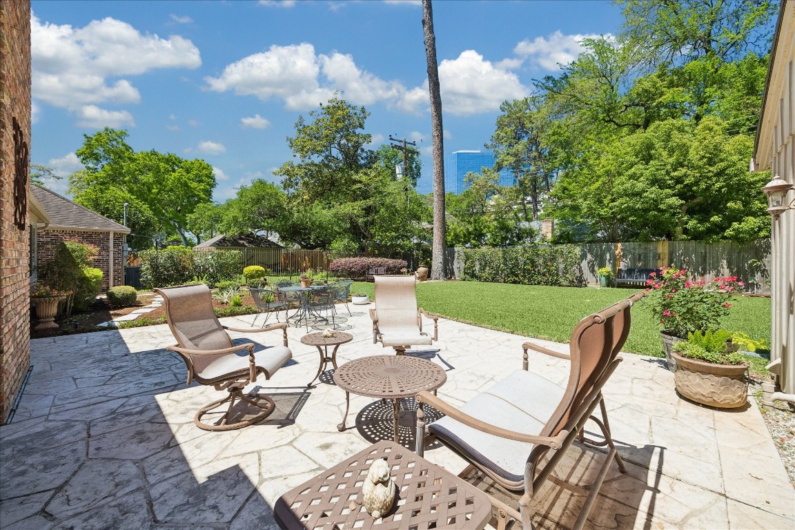 12206 Perthshire Road Houston, TX 77024 - Photo 27 of 30 Relax in the beautifully landscaped backyard.