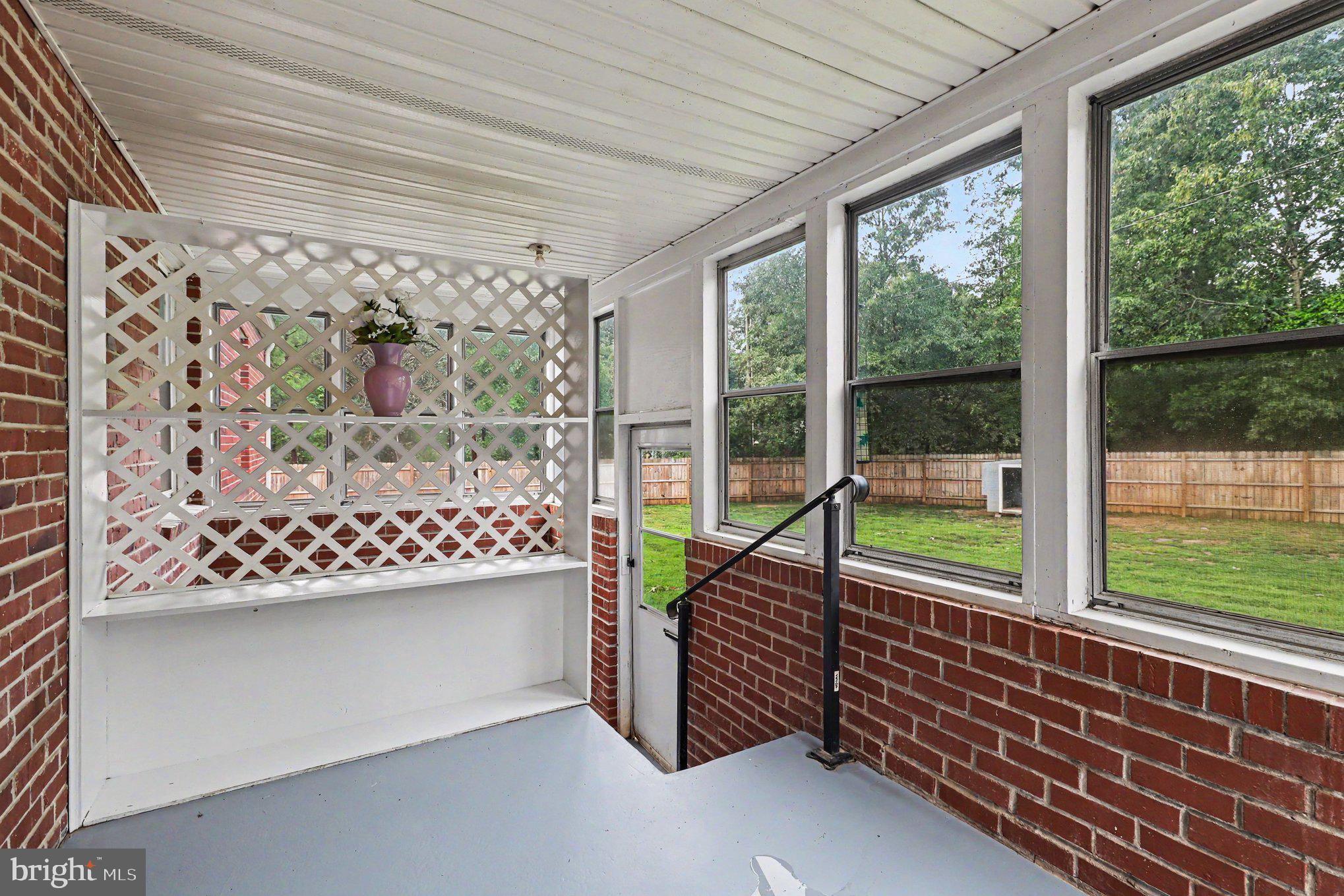 24294 Ruther Glen Road Ruther Glen, VA 22546 - Photo 22 of 28 Screened in porch in backyard