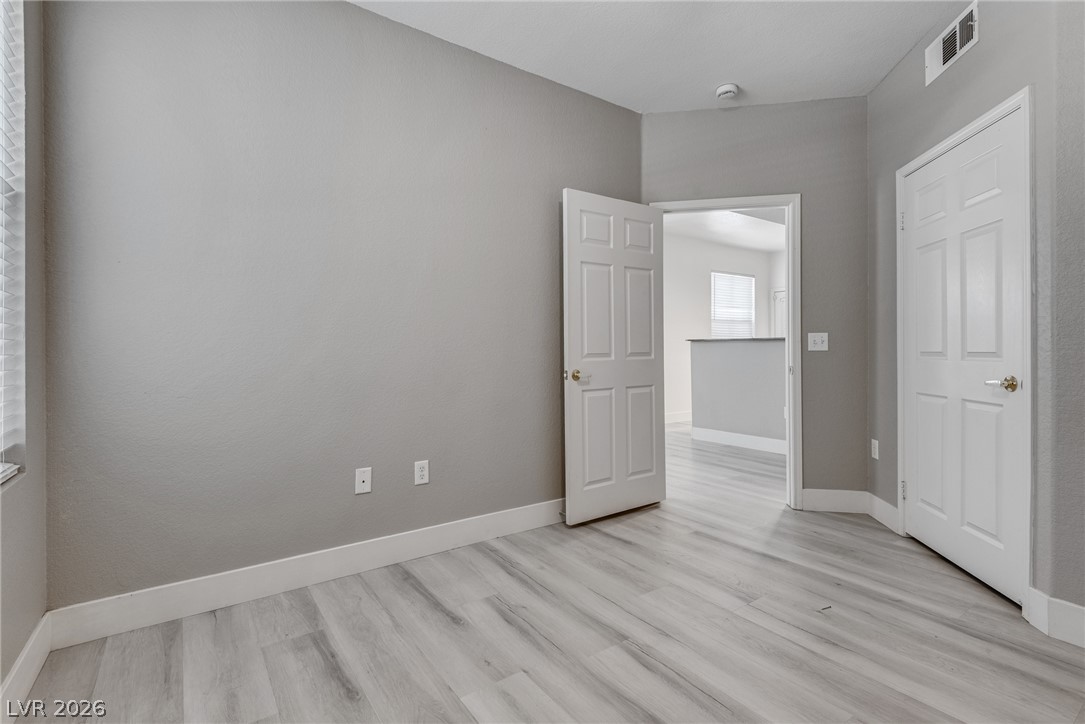 10550 West Alexander Road, Unit 1139 Las Vegas, NV 89129 - Photo 15 of 27 Natural light filters through the window into this flexible room featuring stylish light-toned flooring.