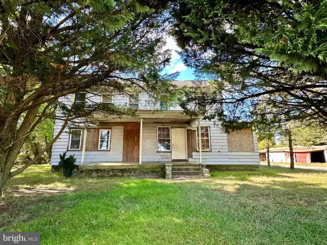 front view of house with a yard