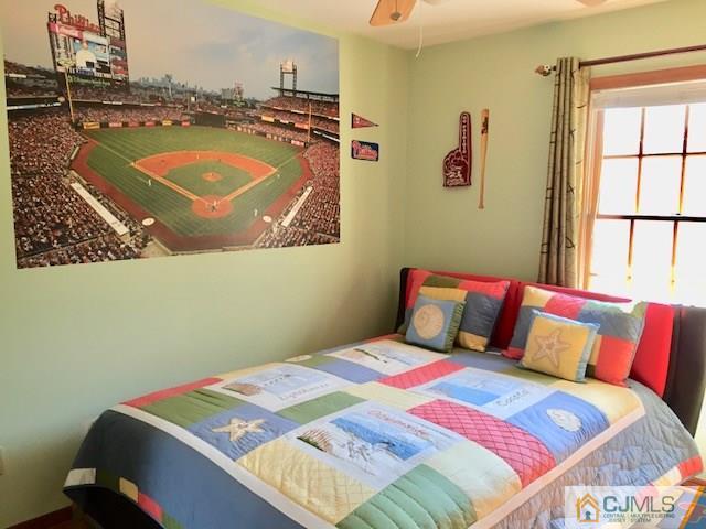 87 Harding Avenue Edison, NJ 08820 - Photo 17 of 25 a bedroom with a bed and a window