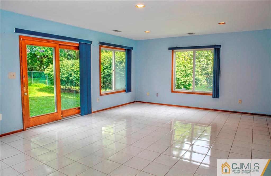 87 Harding Avenue Edison, NJ 08820 - Photo 23 of 25 a view of an empty room with a window