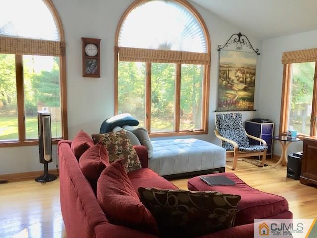 87 Harding Avenue Edison, NJ 08820 - Photo 8 of 25 a bedroom with a bed and wooden floor