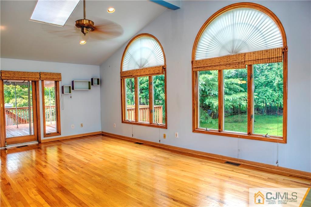 87 Harding Avenue Edison, NJ 08820 - Photo 9 of 25 a view of an empty room with a window