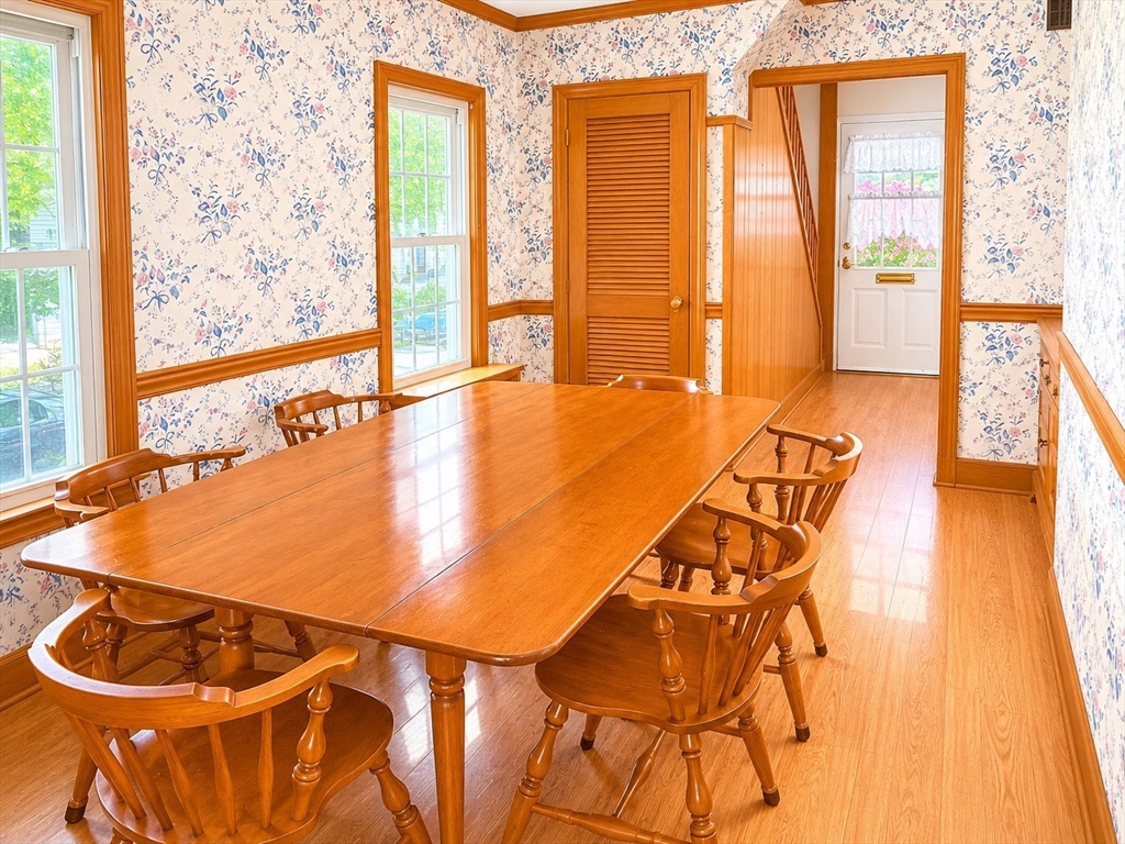 36 Plummer Avenue Lowell, MA 01852 - Photo 8 of 23 a room with wooden floor and windows