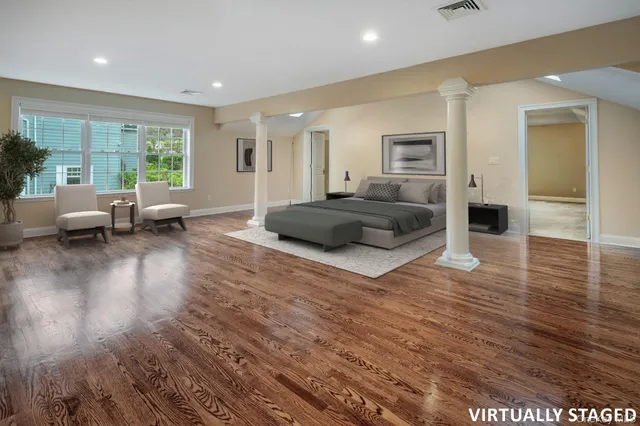 a bathroom with a granite countertop toilet sink and shower