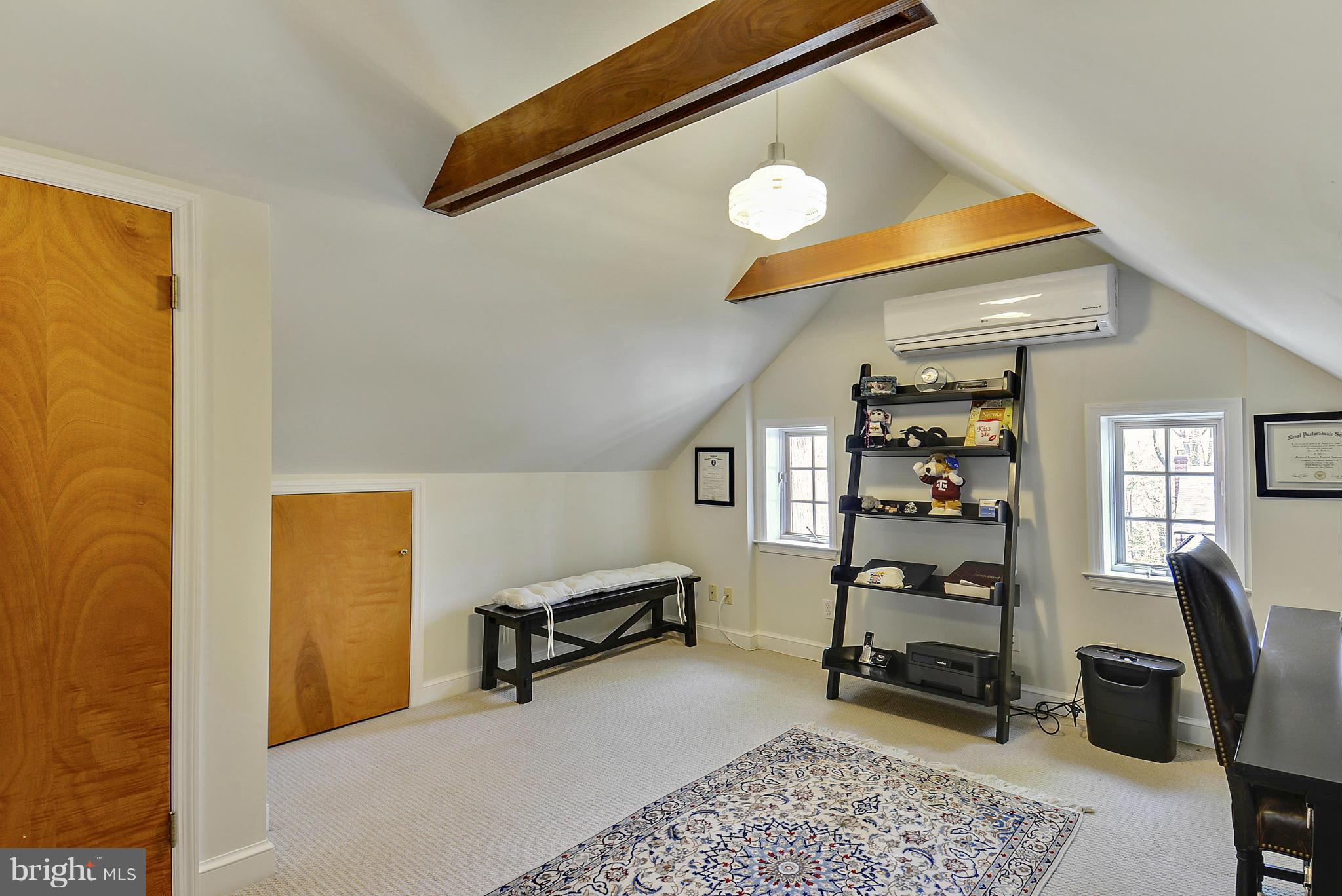 9509 Clement Road Silver Spring, MD 20910 - Photo 22 of 30 a bedroom with a bed and a desk in it