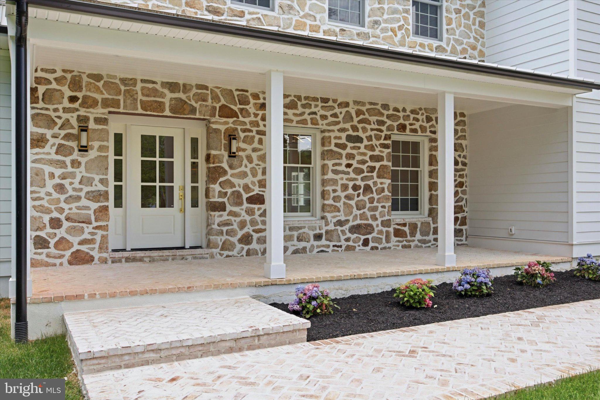 1756 Yellow Springs Road Malvern, PA 19355 - Photo 3 of 43 Charming stone facade with inviting porch.