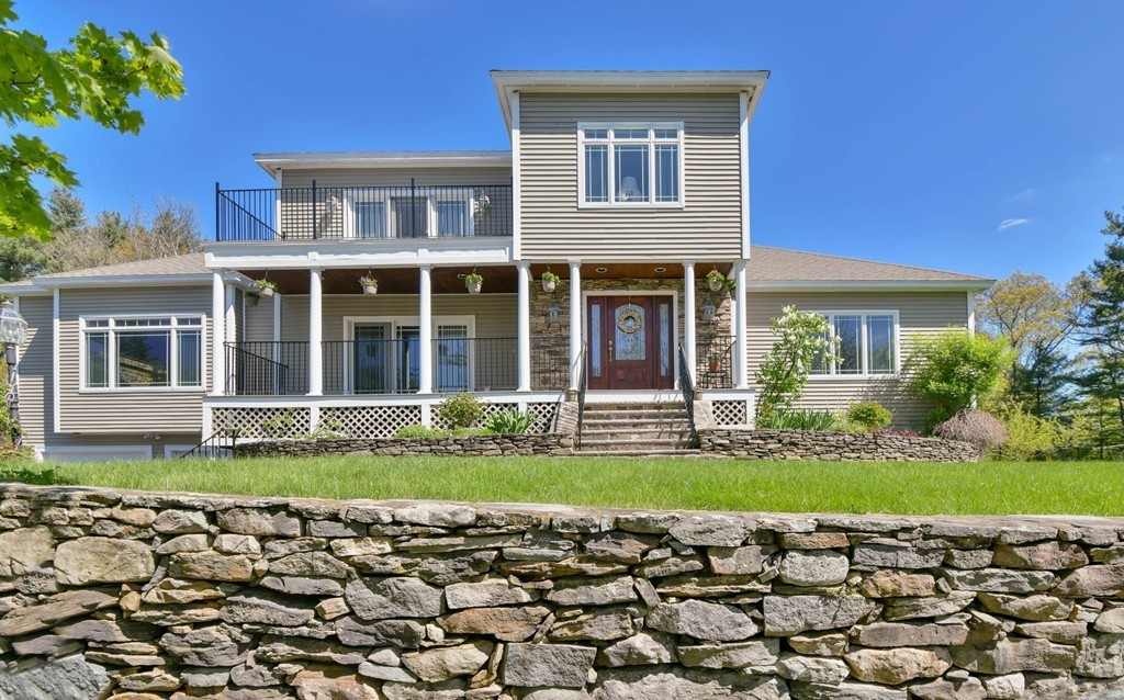 3 Leblanc Drive Danvers, MA 01923 - Photo 3 of 29 front view of a house with a yard