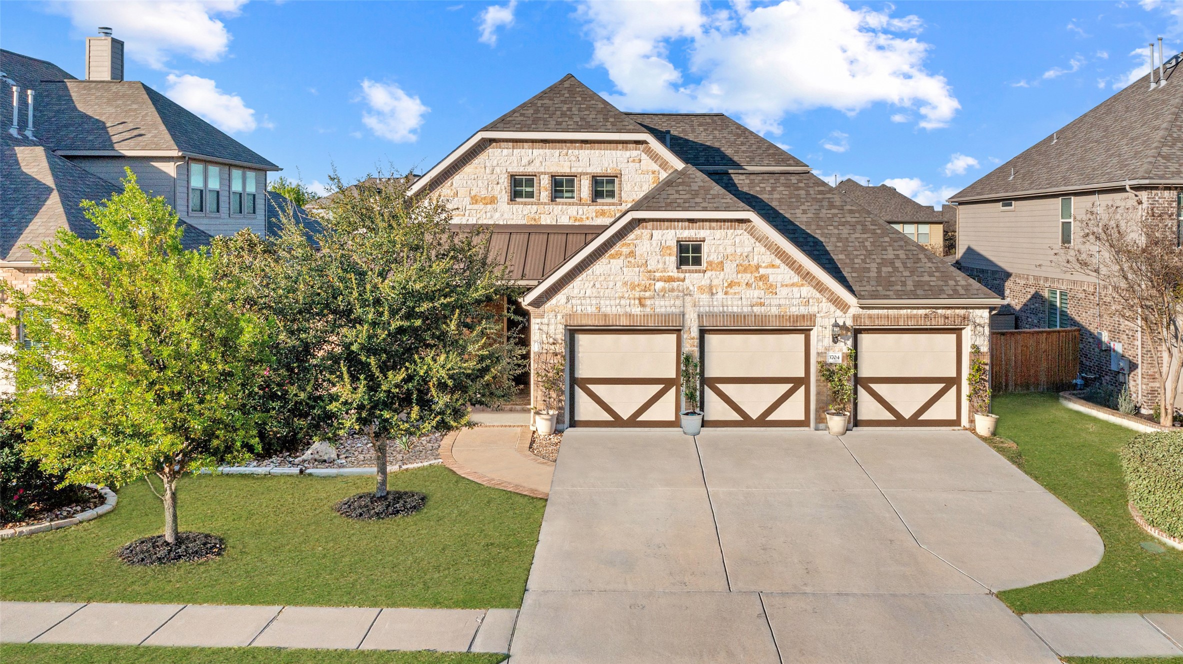 3704 Gildas Path Pflugerville, TX 78660 - Photo 3 of 31 3 car garage with large driveway for lots of parking.