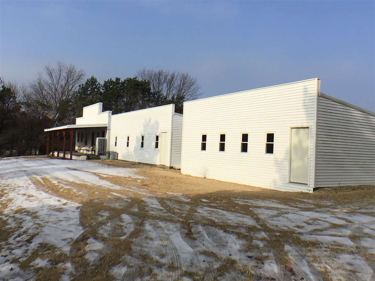 12455 Fish Hatchery Road Pecatonica, IL 61063 - Photo 2 of 32 a view of a house with a yard