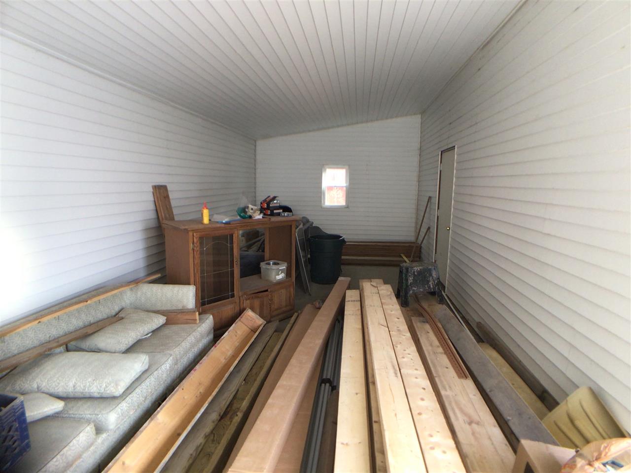 12455 Fish Hatchery Road Pecatonica, IL 61063 - Photo 27 of 32 a workspace with wooden floor