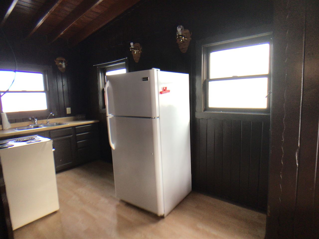 12455 Fish Hatchery Road Pecatonica, IL 61063 - Photo 8 of 32 a white refrigerator freezer and a stove