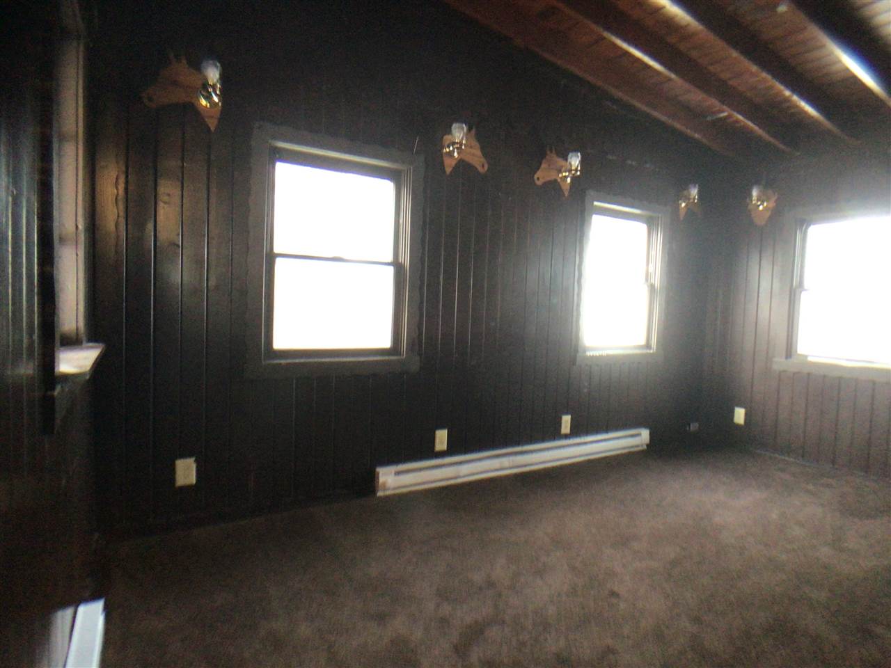 12455 Fish Hatchery Road Pecatonica, IL 61063 - Photo 10 of 32 an empty room with windows and closet