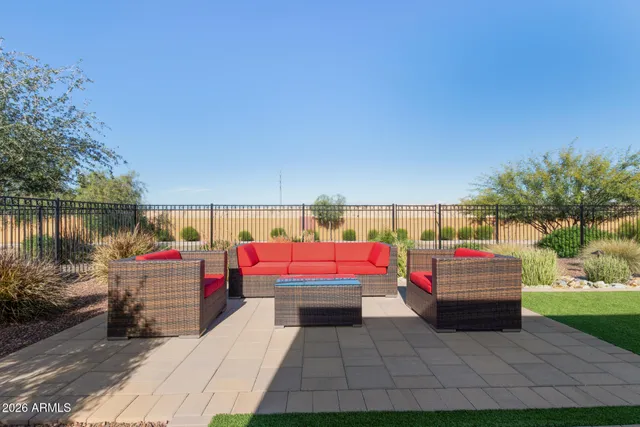 a view of a back yard of the house