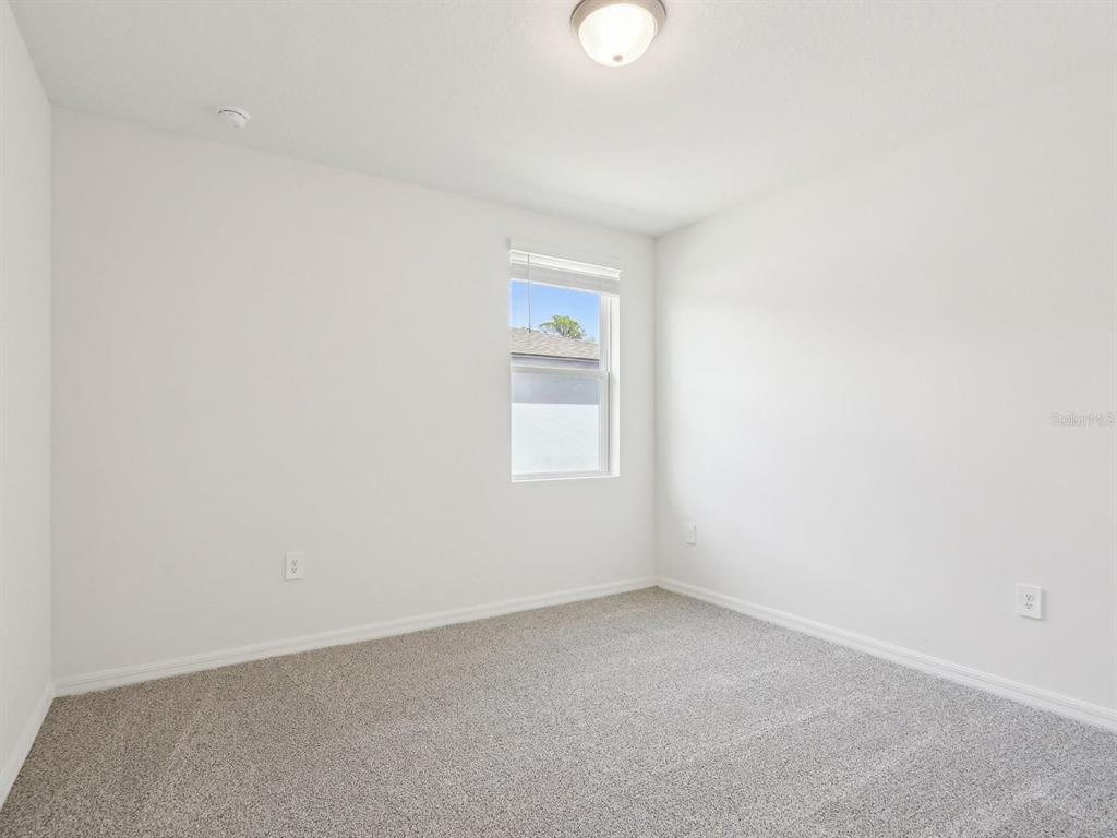 1643 Bark Rdg Drive Auburndale, FL 33823 - Photo 21 of 31 an empty room with a window
