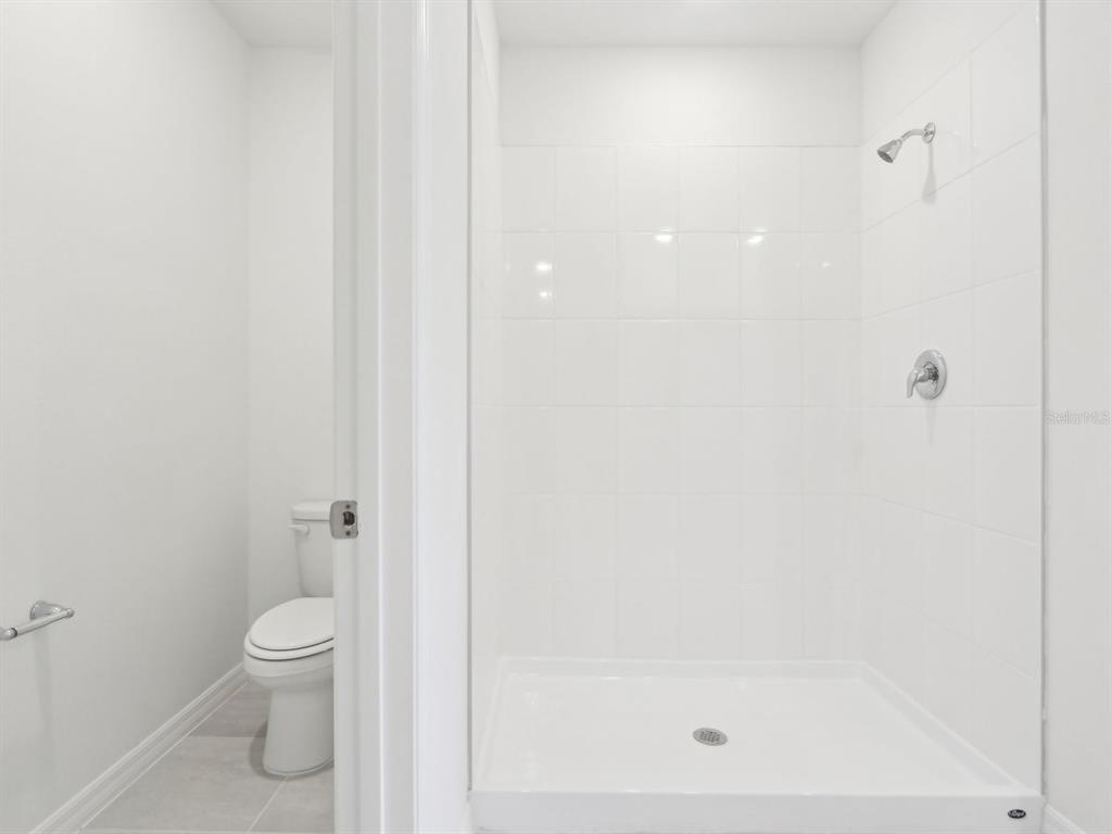 1643 Bark Rdg Drive Auburndale, FL 33823 - Photo 28 of 31 a bathroom with a shower