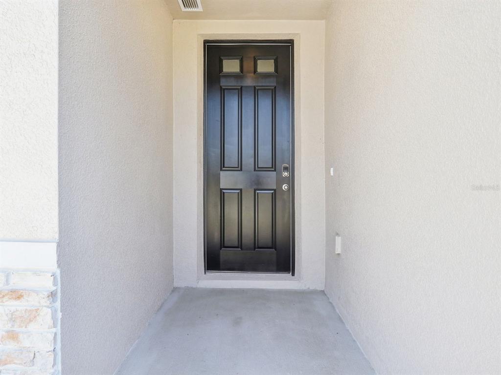 1643 Bark Rdg Drive Auburndale, FL 33823 - Photo 4 of 31 a view of an front door