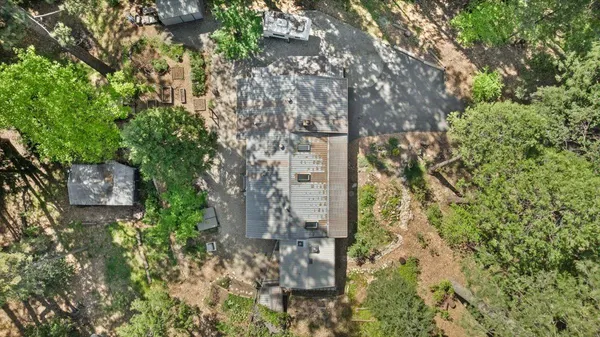 a view of a house with backyard and a slide