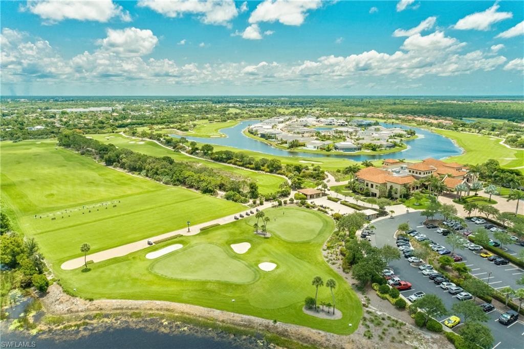 9719 Acqua Court, Unit 214 Naples, FL 34113 - Photo 46 of 50 a view of an ocean yard and outdoor seating