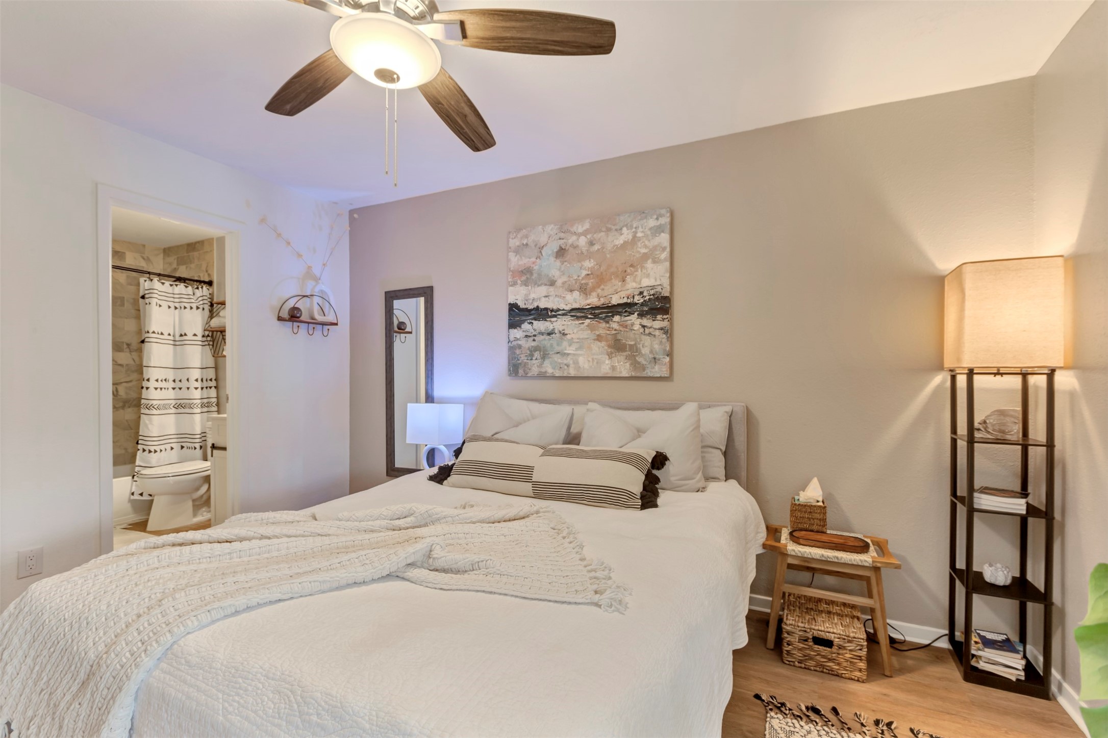 13151 Walden Road, Unit 142 Montgomery, TX 77356 - Photo 13 of 50 a bedroom with a bed and a chandelier