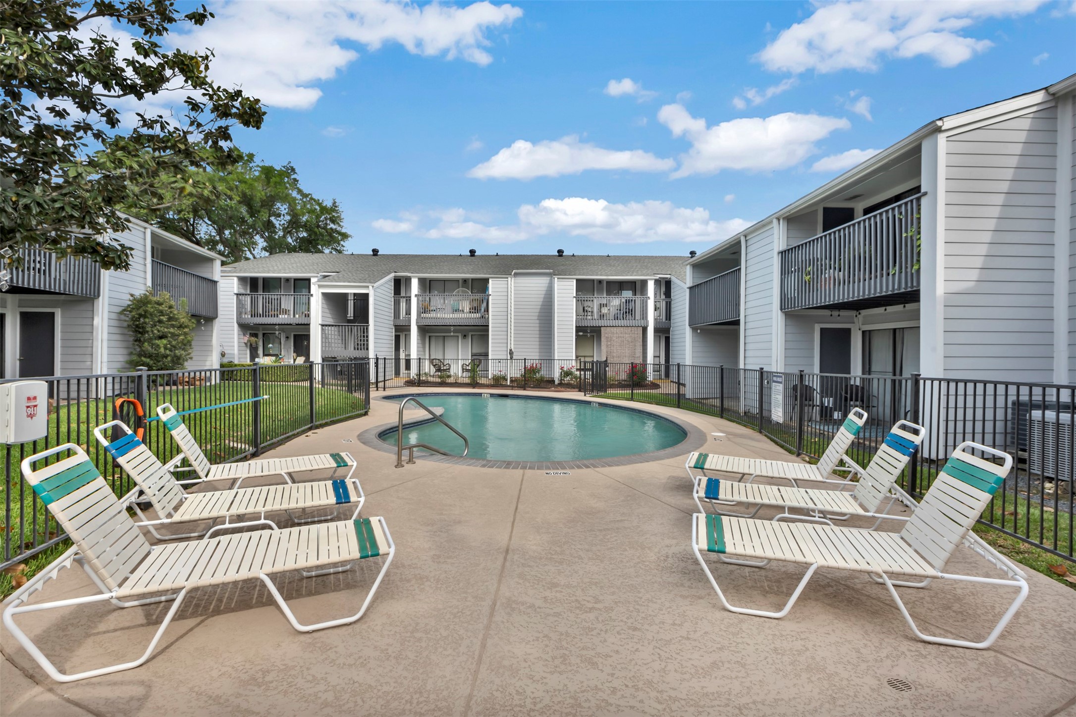 13151 Walden Road, Unit 142 Montgomery, TX 77356 - Photo 25 of 50 a view of a house with swimming pool and sitting area