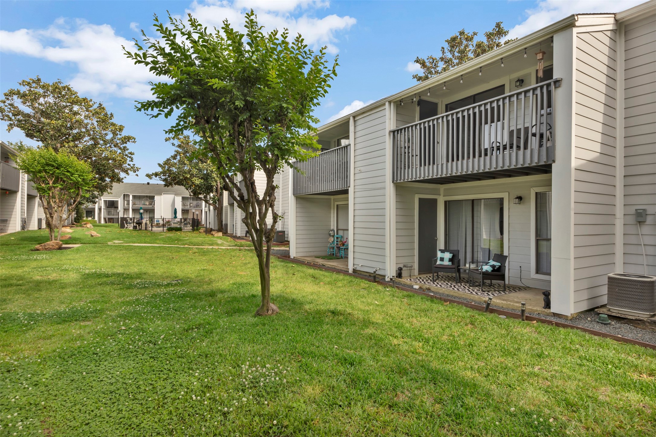 13151 Walden Road, Unit 142 Montgomery, TX 77356 - Photo 27 of 50 a view of a house with a yard