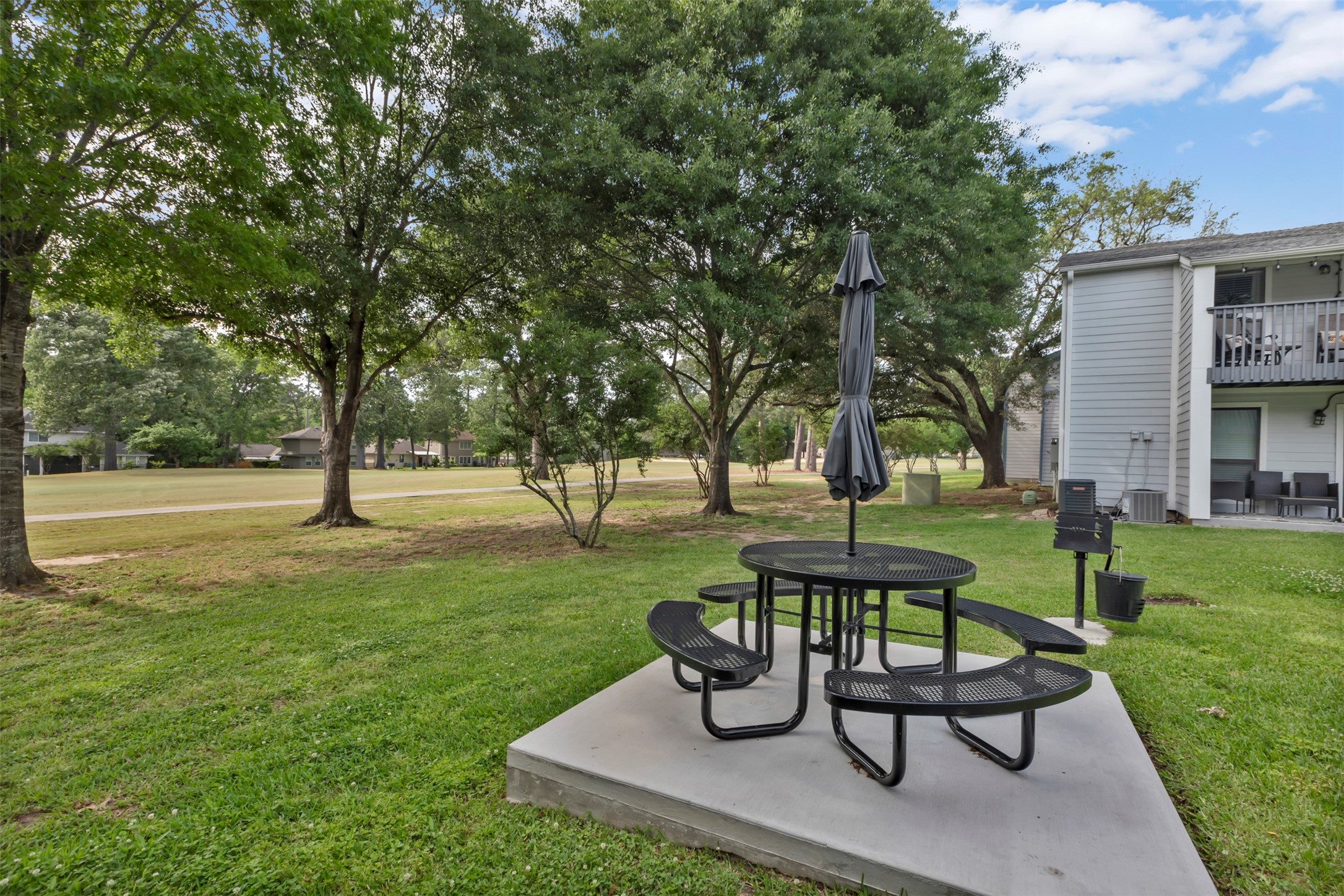 13151 Walden Road, Unit 142 Montgomery, TX 77356 - Photo 29 of 50 a view of a bench in the garden