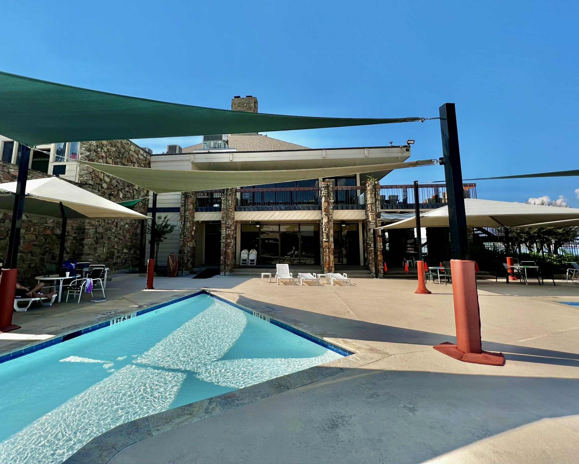 13151 Walden Road, Unit 142 Montgomery, TX 77356 - Photo 34 of 50 a view of a backyard patio and swimming pool