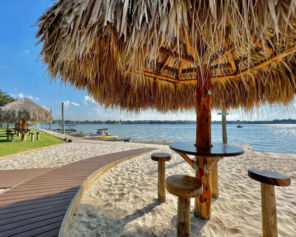 a yard with lots of green space and ocean view