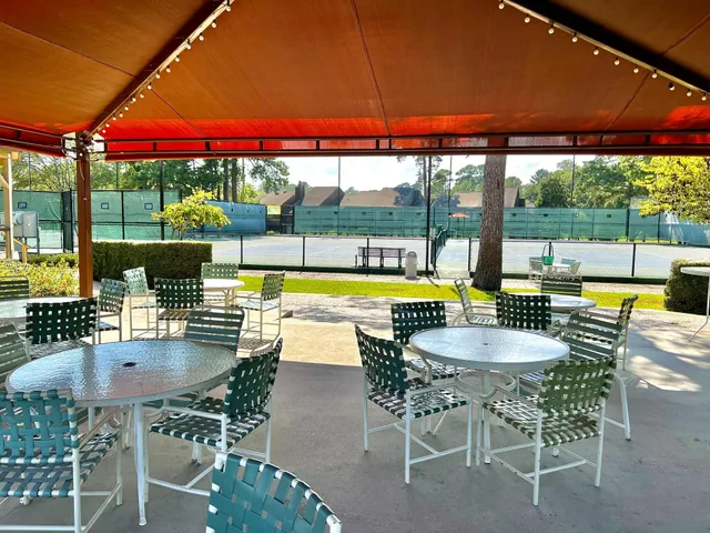 a view of a lake with a yard